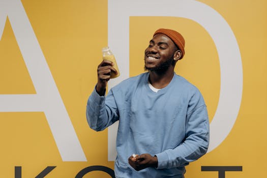 Happy remote worker enjoying a refreshing drink