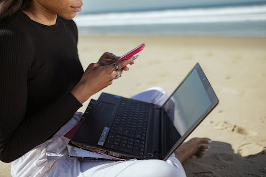 Digital nomad working at the beach