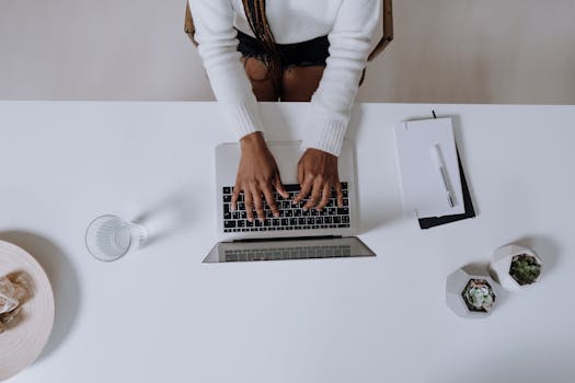 workspace with a laptop and plants