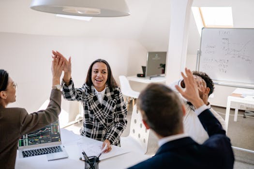 happy remote team celebrating success