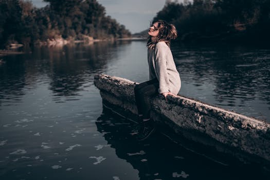 a person meditating in a serene environment