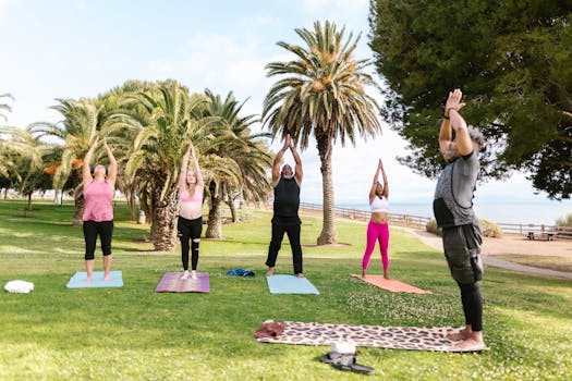 a person practicing yoga in a park