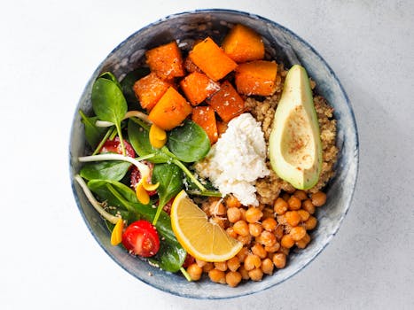 colorful vegan meal with quinoa and vegetables